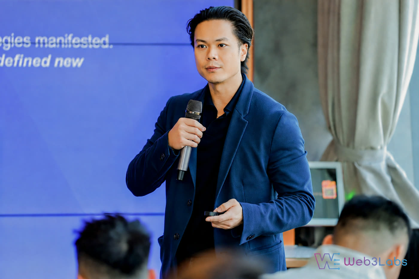 Peter Nguyen speaking at the AI & DePIN Powerhouse podium, Consensus Hong Kong, representing Autonomys