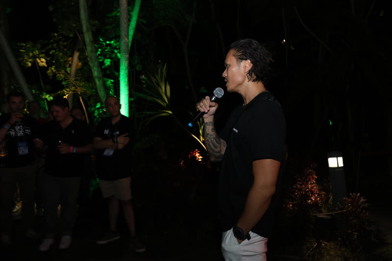 Peter Nguyen speaking at an evening event in Singapore